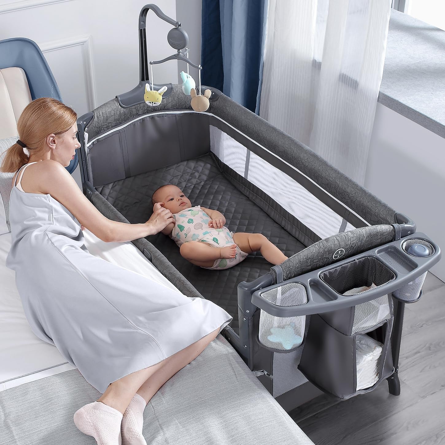 Babybond Baby Bassinet Bedside Crib, Pack and Play with Sheet, Diaper Changing Table and Music Mobile from Newborn to Toddles, Portable Large Playard